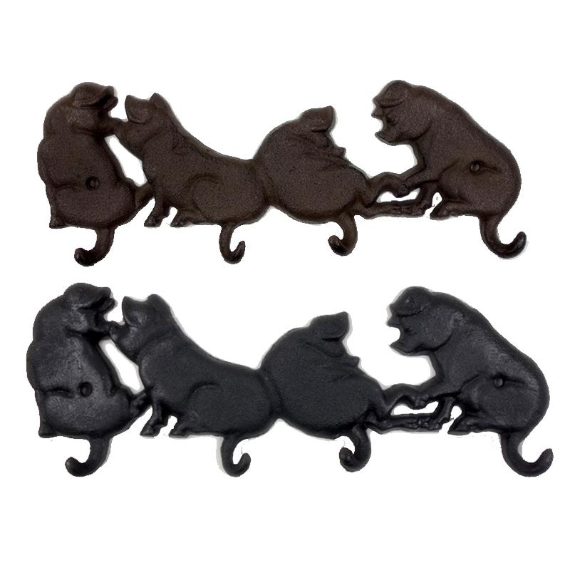 2 Asst. Cast Iron Pig Hooks